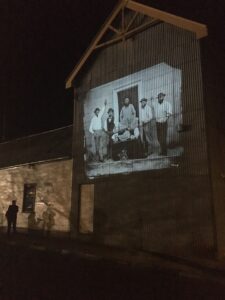 The projection of the Holtermann Gold Specimen on the Old Gulgong Flour Mill